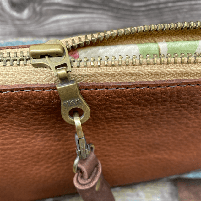 Woven leather wristlet 