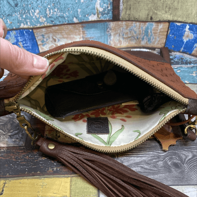 Woven leather wristlet 