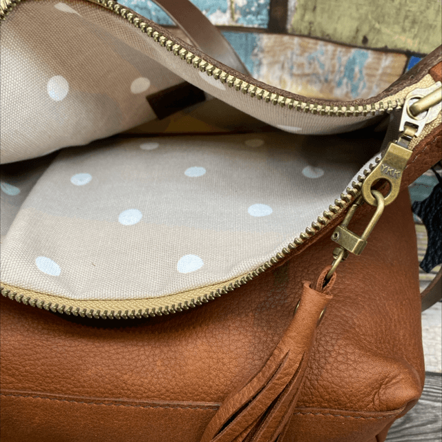 Woven leather ‘Florence’ cross body bag 