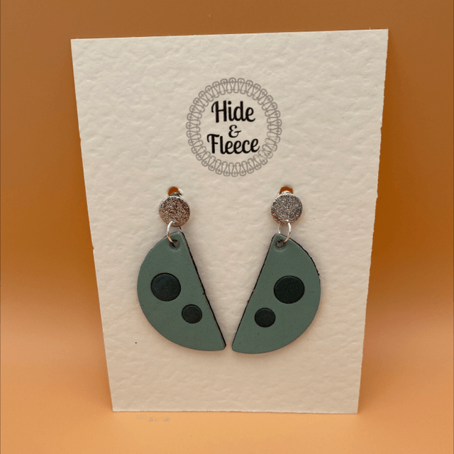 Teal spotted semi circle leather earrings 